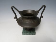 A LATE 19TH CENTURY BRONZED TWIN HANDLED URN. raised on a square marble base, overall H 16 cm