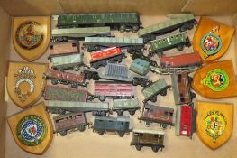 A BOX CONTAINING VARIOUS HORNBY / TRIX MODEL RAILWAY TRUCKS, coaches and various wooden railway