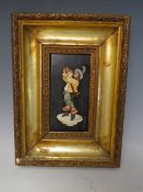 AN ITALIAN 19TH CENTURY PIETRA DURA PANEL, the rectangular panel depicting a Cavalier using specimen