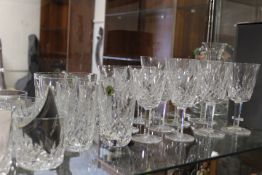 A COLLECTION OF WATERFORD CRYSTAL GLASSWARE TO INCLUDE A DECANTER AND TWENTY FOUR GLASSES,