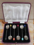 A CASED SET OF HALLMARKED SILVER COFFEE BEAN SPOONS