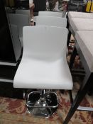 A SET OF THREE MODERN ADJUSTABLE KITCHEN STOOLS