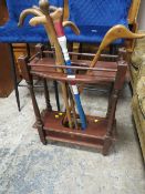 A VINTAGE STICKSTAND WITH ASSORTED STICKS