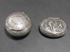 A HALLMARKED SILVER LIDDED PILL / SNUFF BOX TOGETHER WITH ANOTHER EMBOSSED EXAMPLE WITH MARKS TO