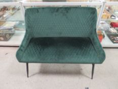 A MODERN UPHOLSTERED GREEN TWO SEATER BENCH SEAT W-102 CM