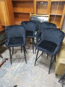 A SET OF FOUR MODERN BLACK KITCHEN STOOLS