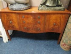 A REPRODUCTION MAHOGANY SERPENTINE SIDEBOARD