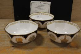 A COLLECTION OF THREE ROYAL WORCESTER COMMEMORATIVE OCTAGONAL BOWLS, celebrating the Golden