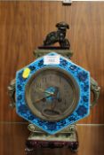 A ORIENTAL CERAMIC CASE MANTLE CLOCK WITH DOG OF FO SURMOUNT A/F