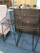 A PAIR OF MODERN BLACK WIREWORK KITCHEN STOOLS