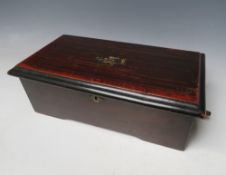 A SWISS MUSIC BOX, the simulated rosewood case opening to reveal a small 31/2