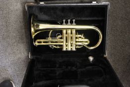 FIVE VARIOUS CASED CORNETS