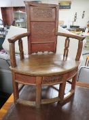 AN UNUSUAL ORIENTAL STYLE HARDWOOD ARMCHAIR