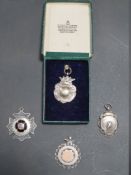 FOUR HALLMARKED SILVER FOBS