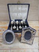 A CASED SET OF HALLMARKED SILVER TEASPOONS - SHEFFIELD 1931, together with two small modern photo