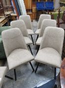 A MODERN SET OF SIX UPHOLSTERED DINING CHAIRS