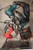 A BOX CONTAINING VARIOUS POWER TOLLS AND EXTENSION LEADS