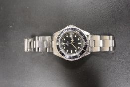 A MENS STAINLESS STEEL DIVERS WATCH BY GROVANNA WITH SWISS RONDA JEWELLED MOVEMENT