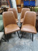 A MODERN SET OF FOUR UPHOLSTERED DINING CHAIRS