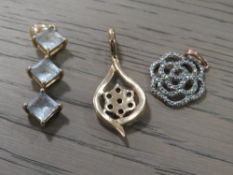 A LADIES 10K THREE STONE DROP PENDANT TOGETHER WITH TWO OTHER PENDANTS (3)