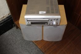 A DENON STEREO AND SPEAKERS (NO CABLES)