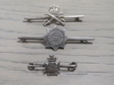 THREE MILITARY SILVER BAR BROOCHES