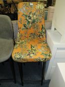 A MODERN FLORAL UPHOLSTERED KITCHEN STOOL