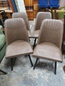 A MODERN SET OF FOUR UPHOLSTERED DINING CHAIRS
