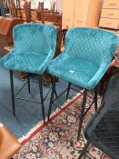 A PAIR OF MODERN TEAL UPHOLSTERED KITCHEN STOOLS