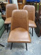 A MODERN SET OF FOUR UPHOLSTERED DINING CHAIRS