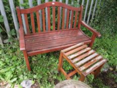 A HARDWOOD GARDEN BENCH AND TABLE