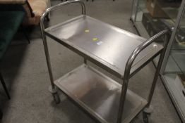 A STAINLESS STEEL SERVING TROLLEY