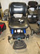 A CARE GO ELECTRIC MOBILITY CHAIR