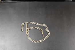 AN ANTIQUE WHITE METAL GENTLEMANS POCKET WATCH CHAIN