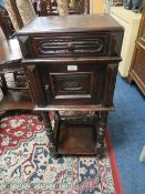 AN ANTIQUE FRENCH STYLE CARVED POT CUPBOARD