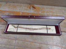 A 9CT GOLD BRACELET SET WITH 0.5CTS OF DIAMONDS - WEIGHT 12.8G (WITH INSURANCE VALUATION