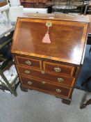 AN EDWARDIAN MAHOGANY INLAID SMALL BUREAU W- 66 CM