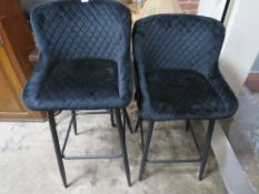 A PAIR OF BLACK MODERN KITCHEN STOOLS