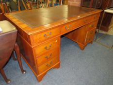 A 20TH CENTURY YEW LEATHER TOPPED TWIN PEDESTAL DESK H-77 W-152 D-90 CM