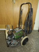 A 1950s DUNLOP TYPE NPE 2 AIR COMPRESSOR ON TROLLEY WITH AIR HOSE 240v