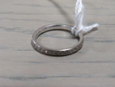 A DIAMOND HALF ETERNITY RING, set with fifteen accent diamonds in unmarked white metal, approx