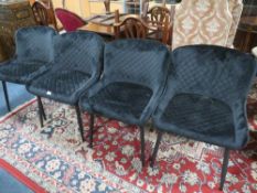 A SET OF FOUR MODERN UPHOLSTERED DINING CHAIRS