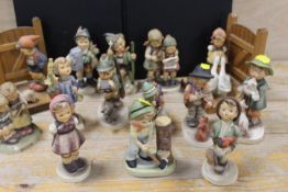 A COLLECTION OF ASSORTED GOEBEL AND HUMMEL FIGURES TO INCLUDE BOOKENDS