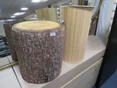 A MODERN UPHOLSTERED LOG EFFECT STOOL AND A LAUNDRY BIN (2)