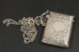 AN ANTIQUE SILVER VESTA CASE ON 24