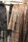 TWO VINTAGE FUR COATS, COMPRISING A BLACK CONEY FUR JACKET TOGETHER WITH A BROWN FUR EXAMPLE (2)