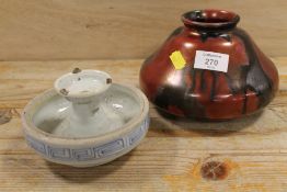 A SQUAT LUSTRE VASE TOGETHER WITH AN ORIENTAL STYLE BLUE AND WHITE CERAMIC PIECE