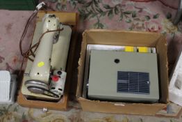 A HELVETIA SEWING MACHINE TOGETHER WITH A HALINAMAT SEMI AUTOMATIC PROJECTOR