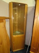 A MODERN ERCOL STYLE CORNER CABINET