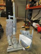 A KIRBY DIAMOND EDITION UPRIGHT VACUUM CLEANER WITH SOME TOOLS